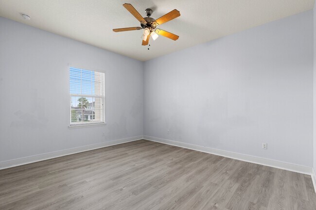 Building Photo - Spacious 6-Bedroom Home Near Lake Nona | 3-Car Garage + Tesla Charger