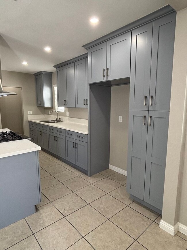 Building Photo - Cozy, Updated, and Pet-Friendly — Your New...
