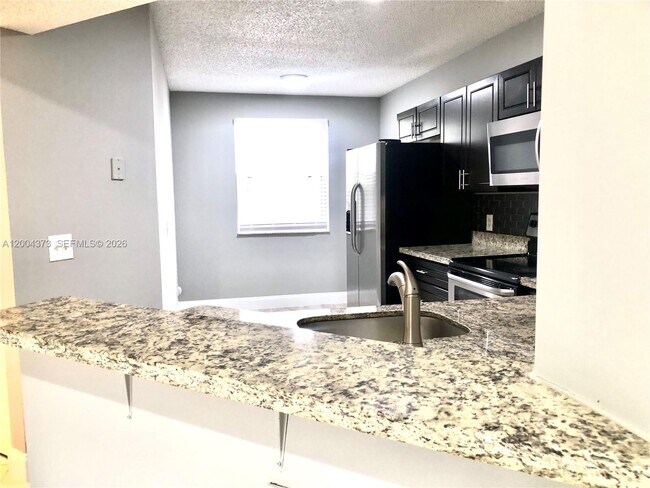 Building Photo - 8761 Wiles Rd