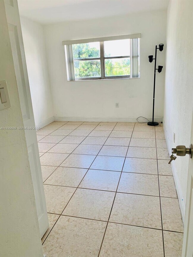 Building Photo - 17101 NW 57th Ave