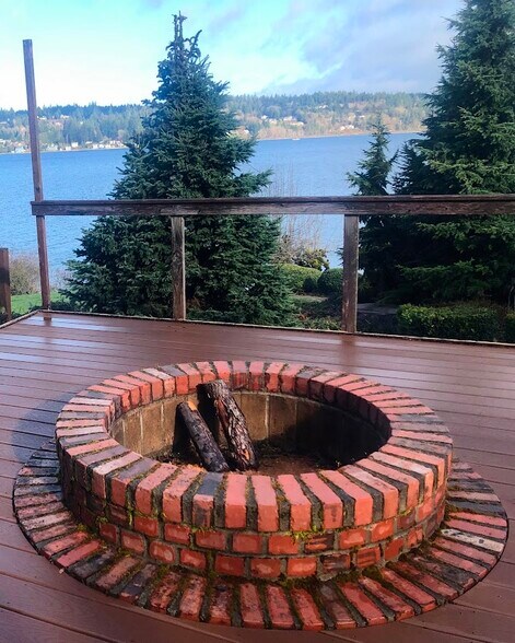 outdoor firepit off the kitchen deck - 7107 120th St NW