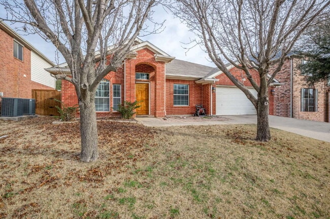 Building Photo - Modern Brick Home with Skylit Kitchen and Private Backyard