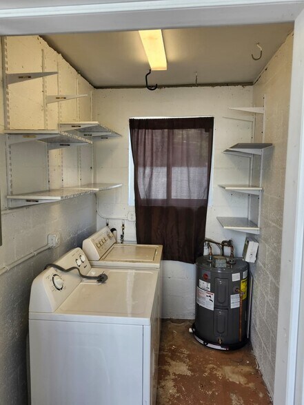 Laundry with washer and dryer. - 2415 Thomas St