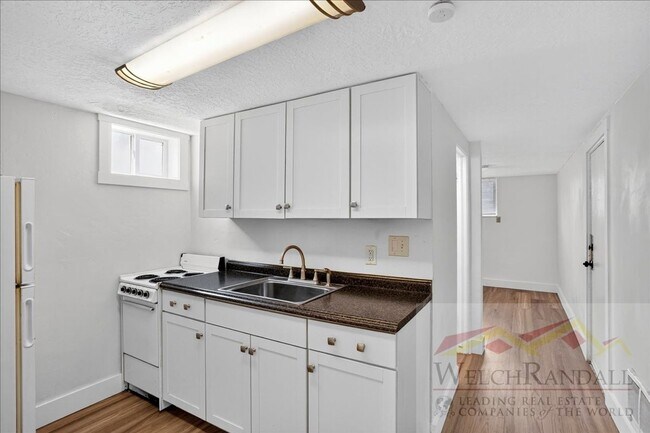 Building Photo - Javid Properties Triplex