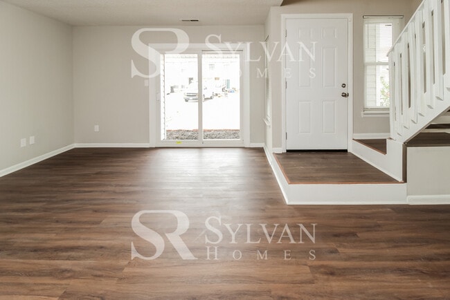 Building Photo - Welcome to this charming abode.