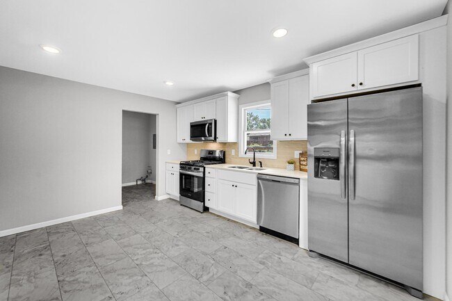 Building Photo - 3413 W 77th Ave