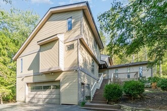 Building Photo - Stunning 4-Bedroom Home with 5 Full Baths + Hot Tub, Wooded Retreat
