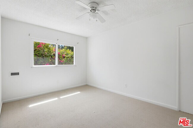 Building Photo - 8401 Tuscany Ave