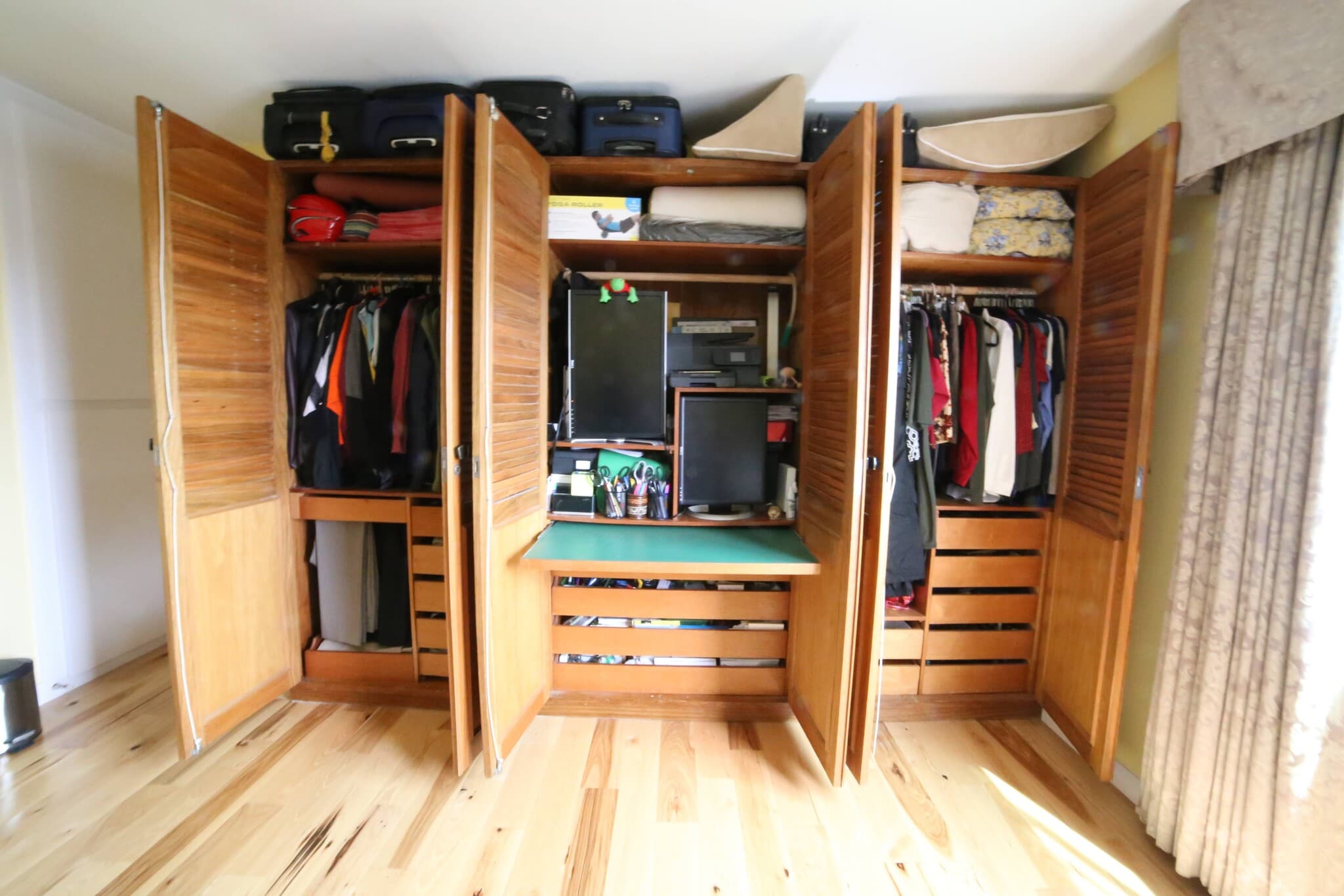 Large closet with built-in retractable desk - 3512 Del Amo Blvd