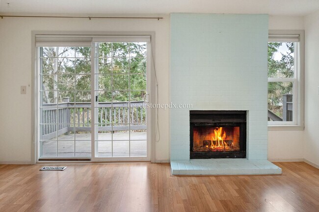 Building Photo - Move in by June 15 and get 2 weeks FREE! Charming Beaverton Home with Fireplace, Deck, and Attach...