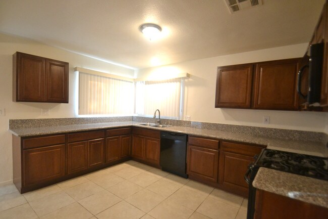 Building Photo - 7047 Nestle Ave