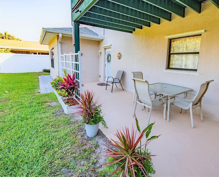 Back Patio and entrance door to upstairs - 6710 S Highway A1A