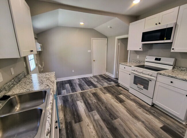 Building Photo - Fully Renovated 3-Bedroom Rental – New Appliances, Huge Yard, Garage, & Individual Room A/C!