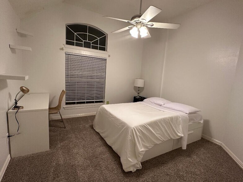 Sink into a plush full-size bed in a calm, spacious retreat - 10913 Alexandria Dr