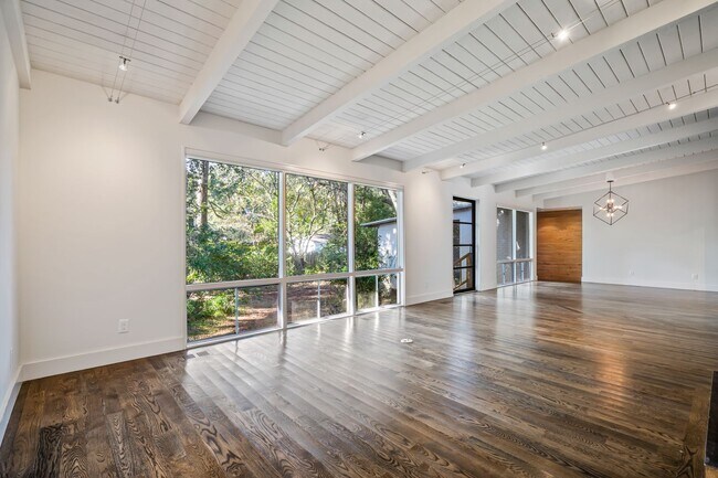 Building Photo - 2/2 with carport - fenced backyard