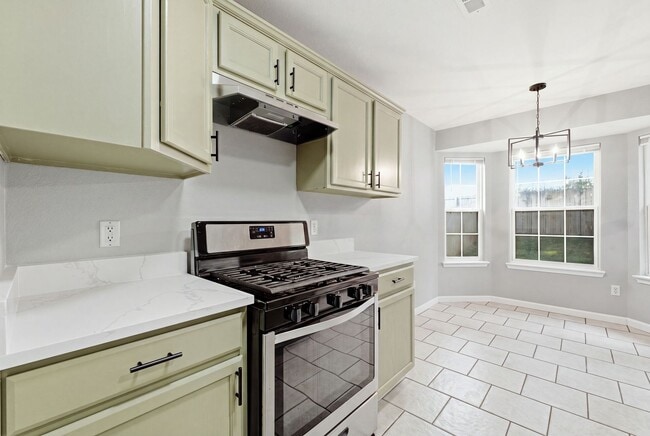 Building Photo - This beautiful ranch-style home