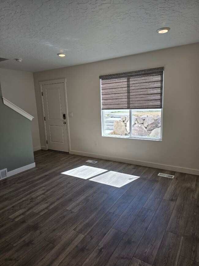 Building Photo - Nearly New, Well Appointed Modern Townhouse w 2 car attached garage