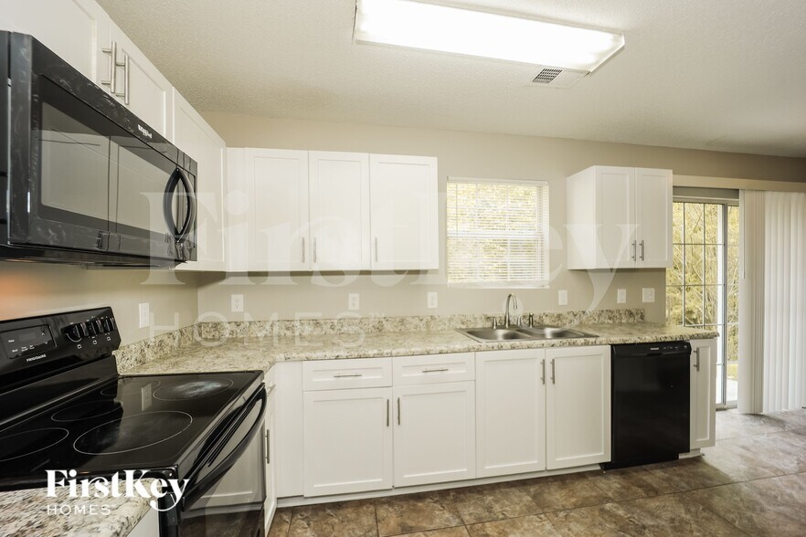 Building Photo - 6763 Merrywood Dr