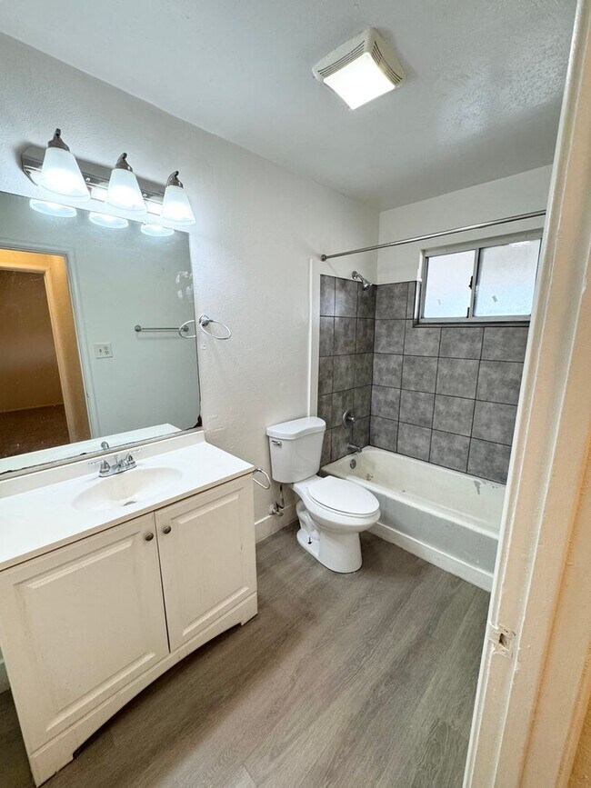 Building Photo - Move-In Special; Upstairs One Bedroom + Private Patio – SEE VIDEO