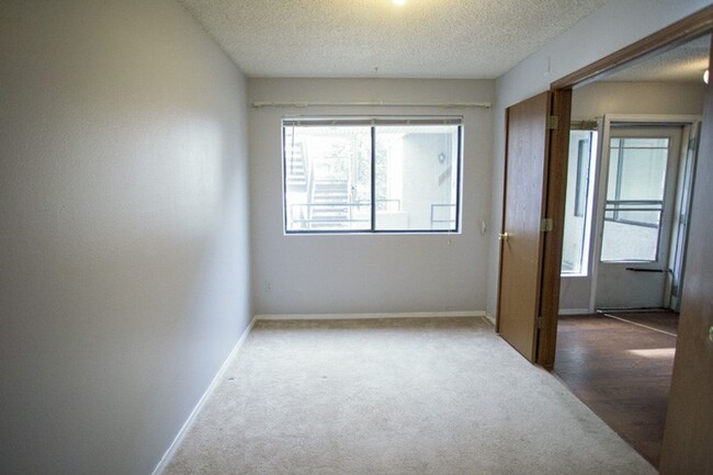 Building Photo - NICE 2-BDRM CONDO WITH FIREPLACE, GARAGE, ...