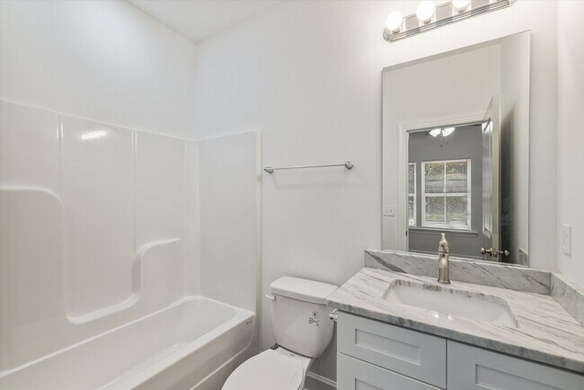 Building Photo - 5/5.5 Townhomes, Built 2024, Walk to stadium! Available August 2026!