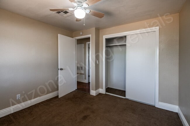 Building Photo - LARGE FENCED YARD WITH DETACHED GARAGE