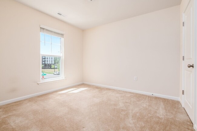 Building Photo - End unit townhome loaded with upgrades close to RTP! Available: Now