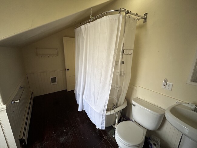 Upstairs full bath with claw footed tub. - 23 Pleasant St