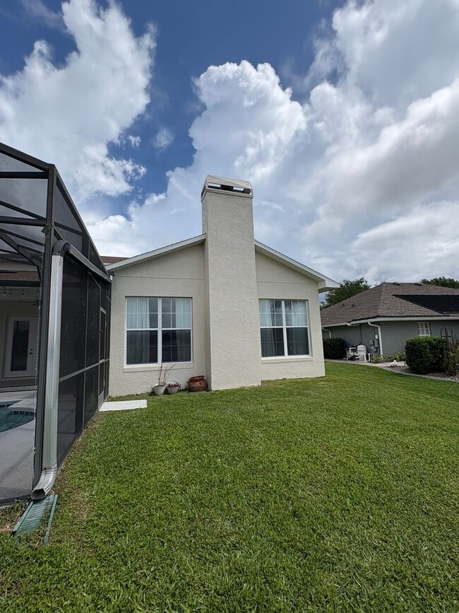 Building Photo - St. Cloud 4 Bedroom, 4 Bathroom Pool Home with Lake View