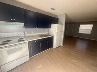 Building Photo - Cute, Coxy & Upgraded 2/1 Duplex!! Apply for FREE This Holiday Season!