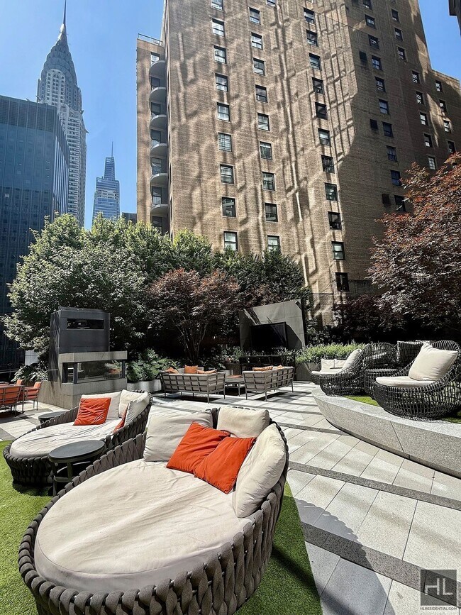 Building Photo - SUNNY NO FEE STUDIO IN THE LUXURY SUMMIT NYC