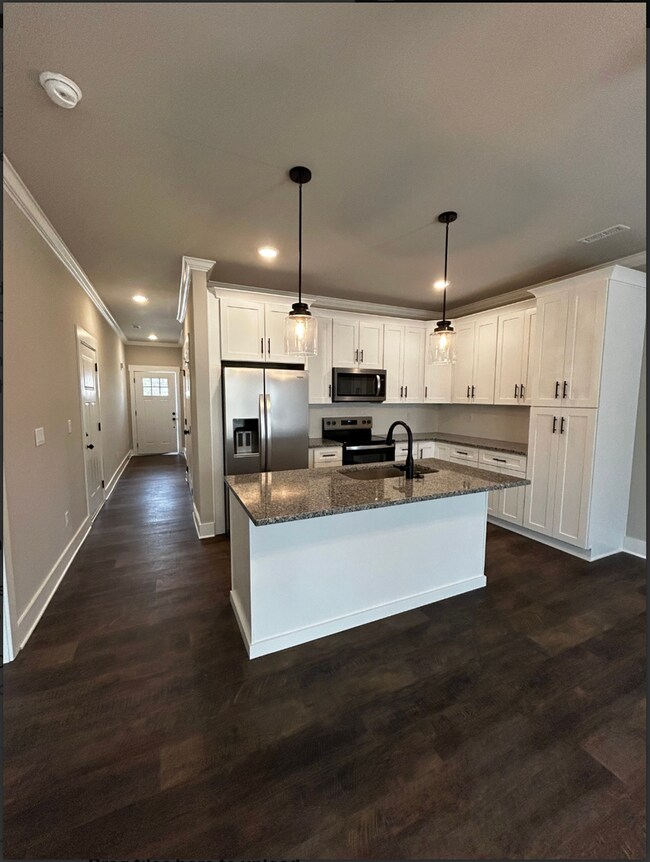 Building Photo - BRAND NEW Charming 2 Bed, 2 Bath, 1 Car Ga...