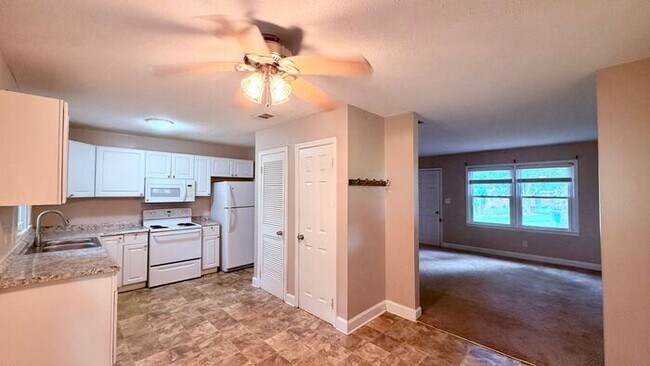 Building Photo - Lithia Springs 3 Bed-1 Bath Stepless Ranch, Private Lot, Carport