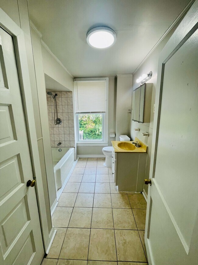 Newly Updated Bathroom with Full Size Bathtub - 817 Homestead St