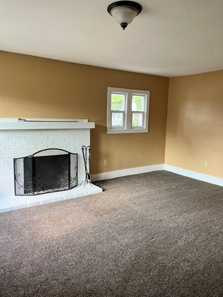 living room with fireplace - 441 16th St SE