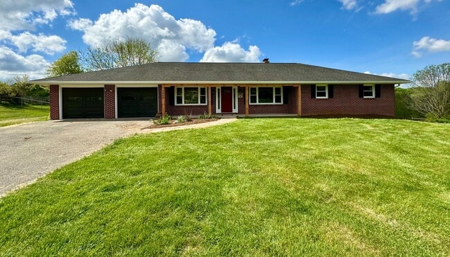Building Photo - Exquisite Brick Ranch with Modern Upgrades, Countryside Charm And Two Car Garage