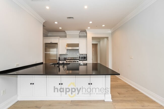 Building Photo - Waterfront Oasis: Fully Furnished 1BR/1.5BA with Marsh Views