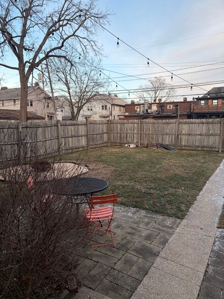 Fenced backyard - shared with other tenant. - 2580 Deming Ave