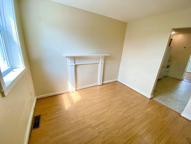 Building Photo - Charming 1BR with 1.5 Baths and Bonus Basement Room in the Heart of Ridgley’s Delight
