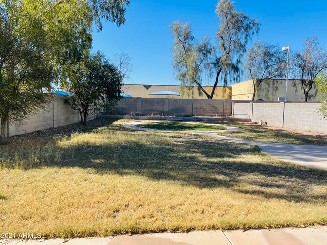 Building Photo - 10642 E Arbor Ave