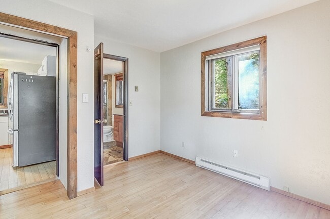 Building Photo - Cabin in the woods!  Fenced Yard!  Year le...
