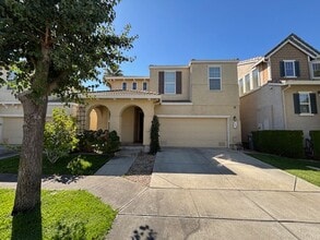 Building Photo - IMMACULATE NATOMAS 4/3 plus office!  Pleas...