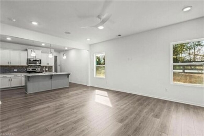 Building Photo - Spacious 3-Bedroom Townhome with Private Patio, Central HVAC & In-Unit Laundry Hookups