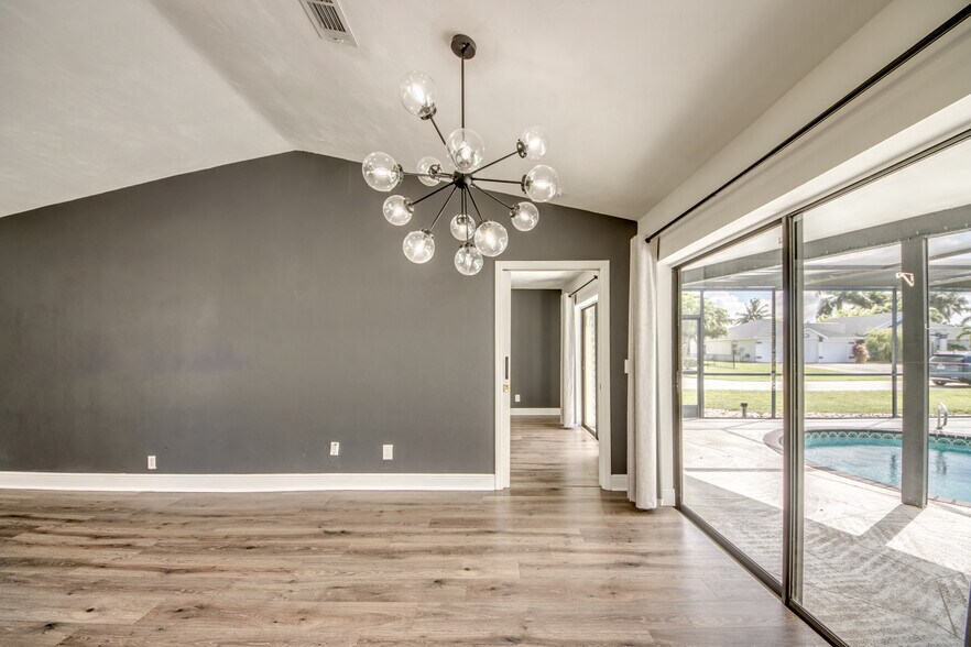 Dining area has a great room layout with new chandelier. - 2316 Everest Pky