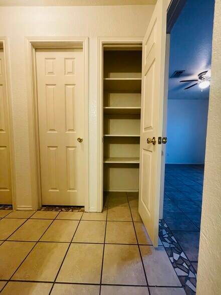 Hall way bathroom pantry - 2804 Cantabrian Dr