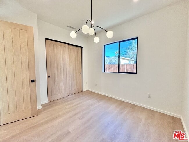 Building Photo - 17850 Saticoy St