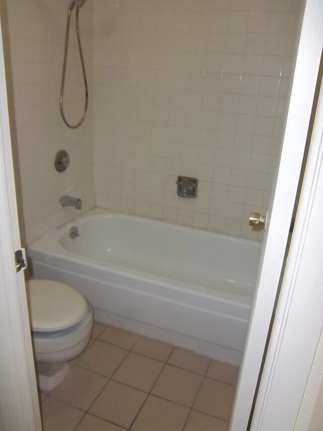 Building Photo - Wonderful 1 BR/1 BA third level condo in secured building.