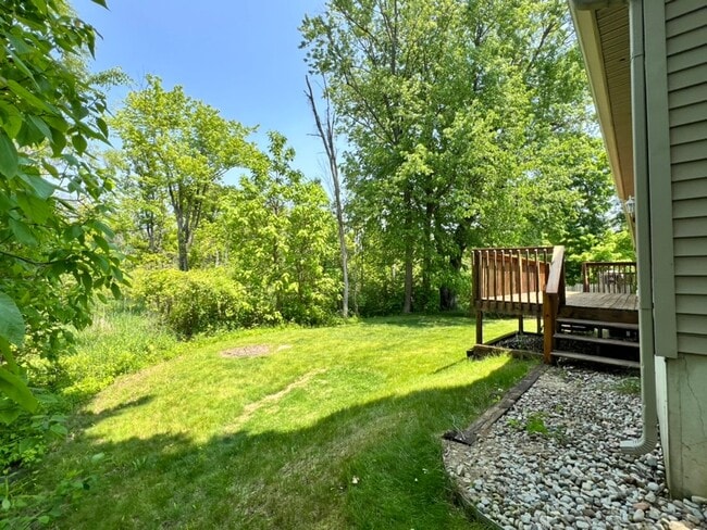 Building Photo - Spacious 3BR Duplex with Finished Basement & 2-Car Garage in Otsego