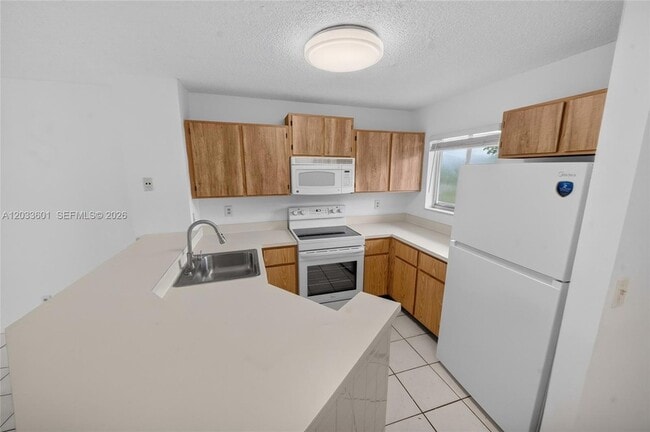 Building Photo - 8750 N Sherman Cir