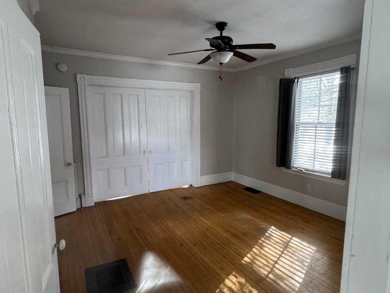 View of the parlor with pocket doors closed - 34 Elm St